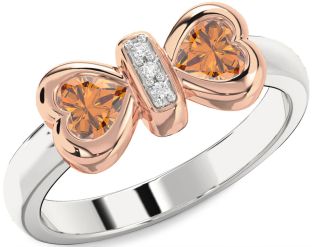 Diamond Emerald Platinum & Rose Gold Bow Two Heart Birthstone Ring