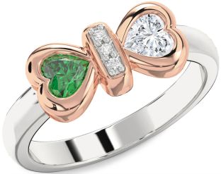 Diamond Emerald Platinum & Rose Gold Bow Two Heart Birthstone Ring