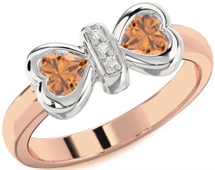 Diamond Emerald Platinum & Rose Gold Bow Two Heart Birthstone Ring