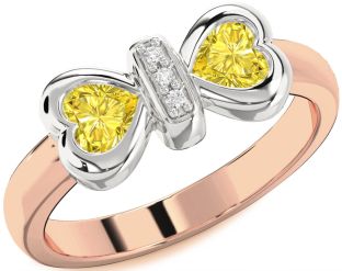 Diamond Emerald Platinum & Rose Gold Bow Two Heart Birthstone Ring